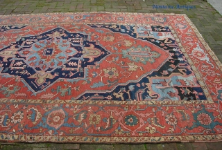 Old Heriz/Serapi 7 ft 3 X 11 ft 4 in. Real decorative thing with great colors and very uncluttered design. Unusual to find such wide borders on a smallish carpet. Well used--  ...