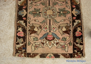 Lilihan pushti-- 2 ft 2 inches by 2 ft. 10 inches. Great old open field Feraghan type design in soft light earth tone colors. Cool border design      