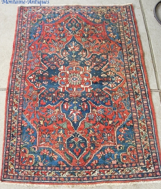 Bahktiari-- 4 ft 6 inches by 6 ft. 8 inches. Village rug with medallion. Nice and  thick with full pile.            