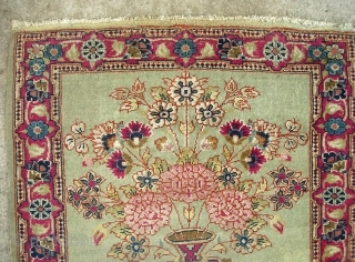 Kerman Pushti-  So called Lavar variety w/ Fine weave and short nap. Rare small size. Wonderful artistic composition with flower pot and green open field. Ends and sides are original with  ...