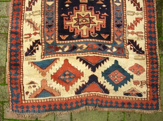 Ancient Caucasian. 3 ft 3 in x 10 ft 11 in. Moghan? Kazak?  Great archaic motifs. Interesting design change on the end borders. Wool is plush and grainy in texture. I  ...