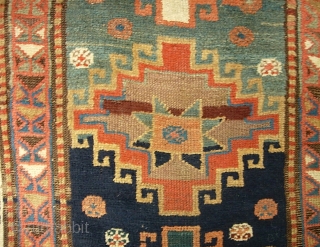 Ancient Caucasian. 3 ft 3 in x 10 ft 11 in. Moghan? Kazak?  Great archaic motifs. Interesting design change on the end borders. Wool is plush and grainy in texture. I  ...