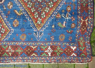 Afshar. 5 ft 6 in x 7 ft 0 in. Bright baby Blue field and herds of various animal. Overall fairly thick but shows a smattering of foundation here and there. Some  ...