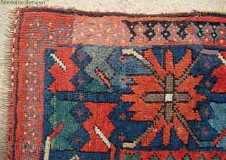 Sauj Bulaq Kurd 4 x 8.4 ft., circa 1890.  Great fat Genge border with wonderful clear natural reds, green, some aubergine; the field design is what Stone 2004:216 identified as "Sauj  ...