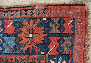 Sauj Bulaq Kurd 4 x 8.4 ft., circa 1890.  Great fat Genge border with wonderful clear natural reds, green, some aubergine; the field design is what Stone 2004:216 identified as "Sauj  ...