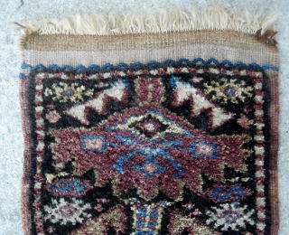 Kurdish. 13 inches by 27 inches. Real unique piece and may have been a bag or pillow cover. Aubergine weft with considerable fading where exposed. Great condition w/ extremely thick lustrous pile.  ...