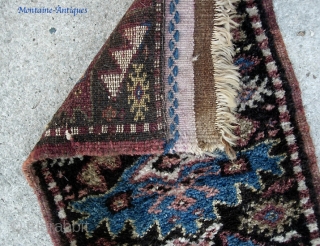 Kurdish. 13 inches by 27 inches. Real unique piece and may have been a bag or pillow cover. Aubergine weft with considerable fading where exposed. Great condition w/ extremely thick lustrous pile.  ...