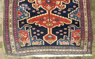 Old Persian. 4 ft 7 x 7 ft 1 inches. Decorative old rug with sensational colors. Dated in several places and looks like they were aiming to say 1300. That would put  ...