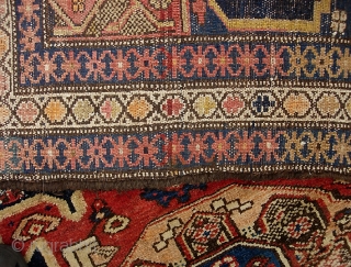 Old Persian. 4 ft 7 x 7 ft 1 inches. Decorative old rug with sensational colors. Dated in several places and looks like they were aiming to say 1300. That would put  ...