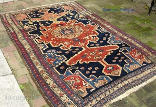 Old Persian. 4 ft 7 x 7 ft 1 inches. Decorative old rug with sensational colors. Dated in several places and looks like they were aiming to say 1300. That would put  ...