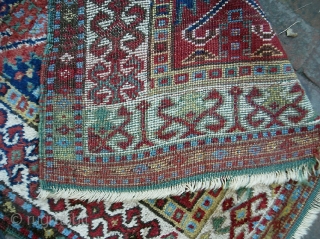 Old Kurd(?) 4 ft 2 x 6 ft 2 inches. Turkish? Persian? Caucasian? As usual, I am clueless. Whatever its origin, it has incredible colors. It is also very old-- possibly 19th  ...