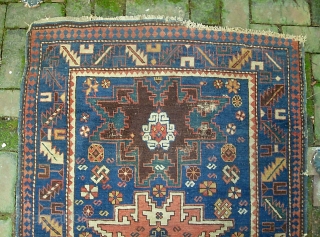 Kuba. 3 ft  x 4 ft 10 inches. Ancient old piece in as found condition. Some oxidation in the brown medallion. Aside from that pile is low and even. Sides and  ...