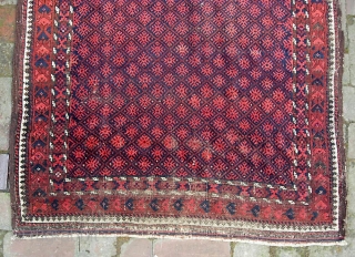 Balouchi-- 3 ft 1 in x 5 ft 3 in. A genuinely old piece, possibly 19th cent. The weave is super fine for a balouch. Condition... not so much. The pictures tell  ...