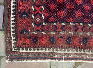 Balouchi-- 3 ft 1 in x 5 ft 3 in. A genuinely old piece, possibly 19th cent. The weave is super fine for a balouch. Condition... not so much. The pictures tell  ...
