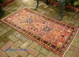 Hamadan-- 2 ft 6 in x 4 ft 11 in. Definitely Mehriban village piece. Very interesting design-- arabesques on soft salmon field. Gets lowish in the middle but no exposed foundation. Ends  ...