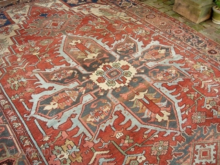 Serapi-- 8 ft 10 in x 12 ft 3 in. A legit antique rug, probably 19th century. It is very open and the medallion is proportionally huge.  Very interesting design and  ...