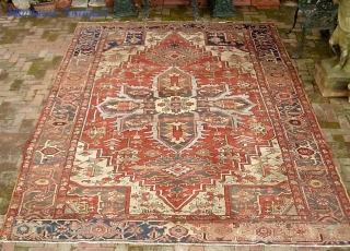 Serapi-- 8 ft 10 in x 12 ft 3 in. A legit antique rug, probably 19th century. It is very open and the medallion is proportionally huge.  Very interesting design and  ...