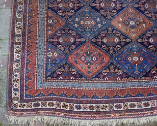 squarish Afshar  5 ft  6 in. by 7 ft.  Wool foundation; 100 years old. All vegetable. Some brown oxidation (mostly in one gul); otherwise, nice condition.    