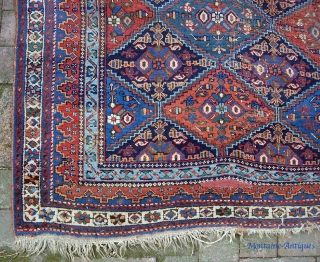 squarish Afshar  5 ft  6 in. by 7 ft.  Wool foundation; 100 years old. All vegetable. Some brown oxidation (mostly in one gul); otherwise, nice condition.    