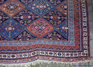 squarish Afshar  5 ft  6 in. by 7 ft.  Wool foundation; 100 years old. All vegetable. Some brown oxidation (mostly in one gul); otherwise, nice condition.    