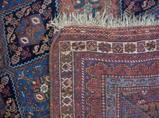 squarish Afshar  5 ft  6 in. by 7 ft.  Wool foundation; 100 years old. All vegetable. Some brown oxidation (mostly in one gul); otherwise, nice condition.    