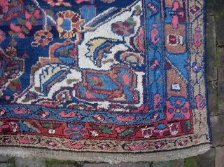 Kurdish. 4 ft 5 inches by 6 ft 5 inches.  Possibly from the Bidjar  area. Bold medallion design; terrific vegetable colors with lots of interesting abrashes. Original braided end weaves  ...