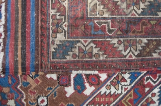 Afshar. 4 ft 0 inches by 5 ft 5 inches. Circa 1900 or earlier. Nomadic tribal piece has wide kelims at both ends. Interesting-- center warps are candy cane wool; peripheral warps  ...