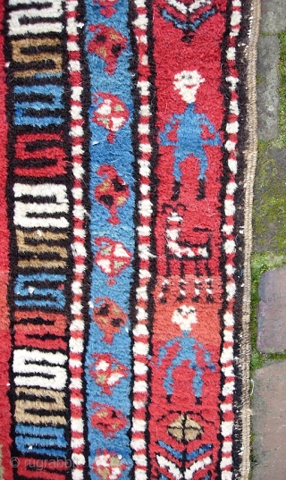 Northwest Runner-- 3 ft 10 inches x 10 ft 3 inches. Bright, lively, charming tribal piece with little smiling people and animals along one side. Great colors and ivory medallions. Note the  ...