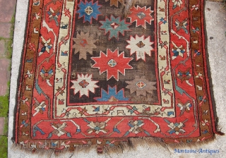 Real Antique Kurd(?) 3 ft 3 inches by 7 foot 0 inches. Magnificent ancient thing. More holes than a Swiss cheese. Do what I did: buy now and figure out what to  ...