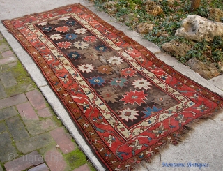 Real Antique Kurd(?) 3 ft 3 inches by 7 foot 0 inches. Magnificent ancient thing. More holes than a Swiss cheese. Do what I did: buy now and figure out what to  ...
