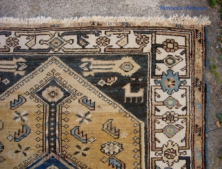 Tribal Rug. 3 ft 5 inches by 5 foot 4 inches. Nice colors and charm. Condition issues are evident in the photos so examine carefully.        