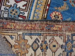 Tribal Rug. 3 ft 5 inches by 5 foot 4 inches. Nice colors and charm. Condition issues are evident in the photos so examine carefully.        