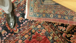 1920's Persian Sarouk measuring 10'8"x 13'3" in great condition, full pile, one end requires overcasting, some binding is starting to curl.  Thanks!          