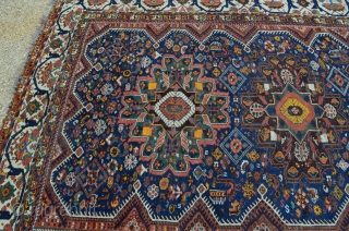Fresh from an estate from a Ranch in the Pristine area of Northern Idaho: A 1920's to 1930's wool on wool Ghashghai rug, size is 7'3"x9'9", has wear down to foundation on  ...