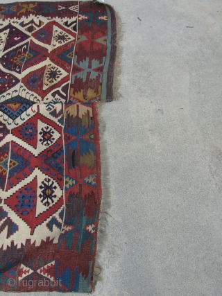 Here's an old turn of the century Turkish (anatolian) kilim comprised of two seperate peices woven together (common feature), size is 4'10"x9'5", one end is better off than the other (please see  ...
