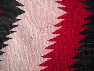 Fresh from an estate and as found: A 1900's to 1920's
3'x5'4" Antique Navajo rug, churro wool, nice tight weave,,
great colors, has a little bleeding (the white area's seem a faint pink....), would  ...
