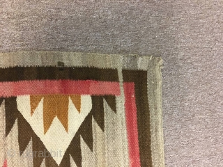 Nice older 1920's  Navajo with an 'A' side and a 'B' side measuring 56"x 71" ( couple inches wider from one end to the next), few stains, otherwise in good condition. 