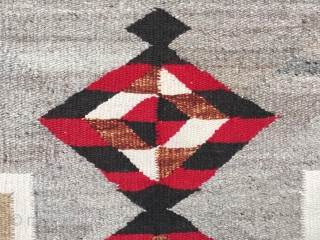 As found: A nice vintage mid century Navajo rug measuring 3'2" wide at one end, and 3'4" at the other end, and 4'8" long.  In pretty good shape except for a  ...