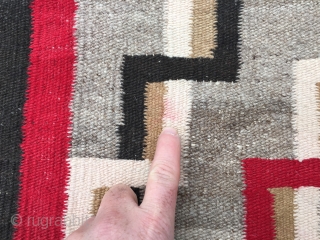 As found: A nice vintage mid century Navajo rug measuring 3'2" wide at one end, and 3'4" at the other end, and 4'8" long.  In pretty good shape except for a  ...