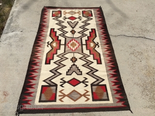 Aside from the little bit of the red color fading on one side, this 1930's JB Moore Storm Pattern Crystal Vintage Navajo Rug measuring 3'7"X 6'2" is good to go.  Woven  ...