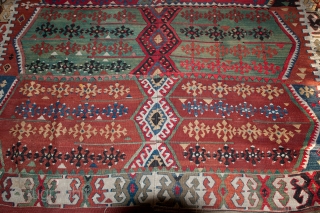 Pretty vintage Turkish Kilim that needs service, measuring 144"X 66".  Rug has a tennis ball size hole and a few other things that will need to be corrected.  Thanks.  