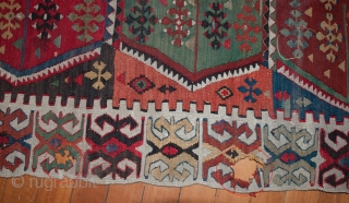 Pretty vintage Turkish Kilim that needs service, measuring 144"X 66".  Rug has a tennis ball size hole and a few other things that will need to be corrected.  Thanks.  