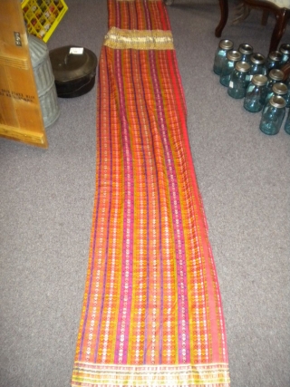 I found this interesting piece of silk, what seems like handwoven, textile.  I don't know too much about it.  The length is probably 20 or so feet, and the width  ...