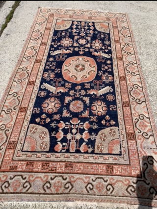 4’4”x 8’1” old Khotan with two small old and not so good reweaving jobs at one end. Otherwise, nice one for the price.          