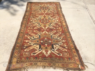 As found: 1880's to 1900's Chelaberd rug measuring 4'8"x 9'8" that needs service. 1.  I am pointing at 2 area's that need better wool match. 2.  one corner needs to  ...