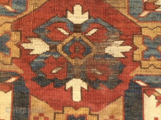 As found: 1880's to 1900's Chelaberd rug measuring 4'8"x 9'8" that needs service. 1.  I am pointing at 2 area's that need better wool match. 2.  one corner needs to  ...