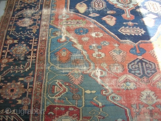 Here we have an old serapi, size 13'9"x9'4" in need of restoration.  It is a pretty carpet in my opinion.            