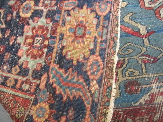 Here we have an old serapi, size 13'9"x9'4" in need of restoration.  It is a pretty carpet in my opinion.            