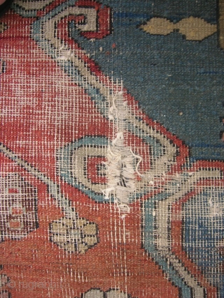 Here we have an old serapi, size 13'9"x9'4" in need of restoration.  It is a pretty carpet in my opinion.            
