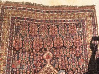 As found: 1900's to 1920's Persian Khamseh in good condition measuring 7'5"x 4'7", three inches difference in width from one end to the other (4'6" to 4'9"), pile is low and even,  ...